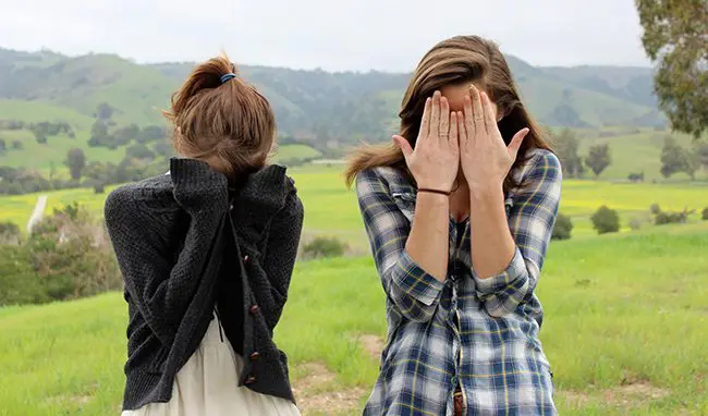 Girlshiding-faces-hiding-from-life