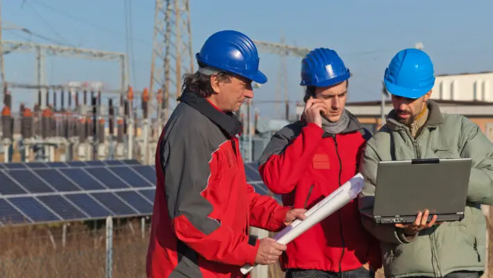 Engineers at Work In a Solar Power Station