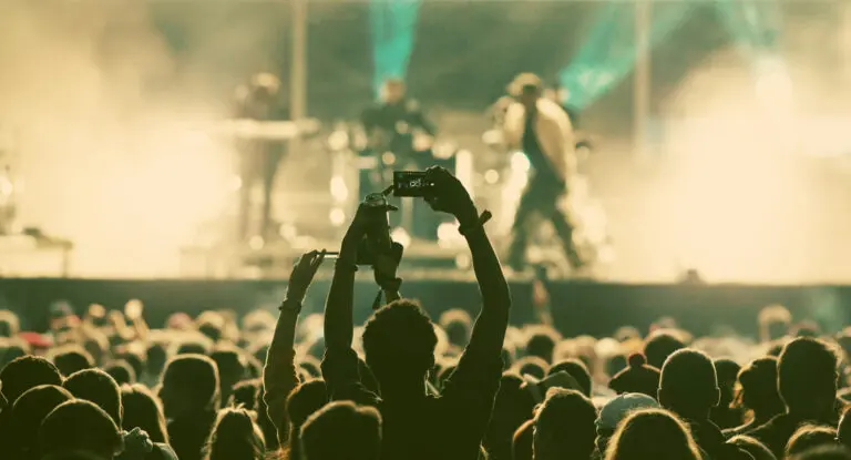 Crowd at concert and blurred stage lights