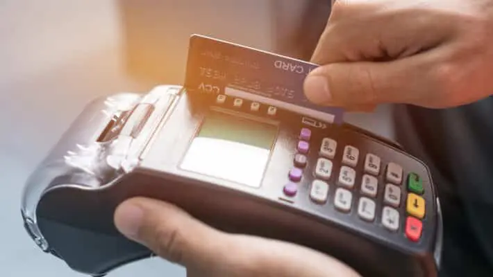 Payment with Mockup cardholder, credit card through terminal for purchase or sell products service, business button or swiping to buy shopping through electronic transaction in retail at store counter