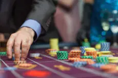 Man placing a bet at the casino