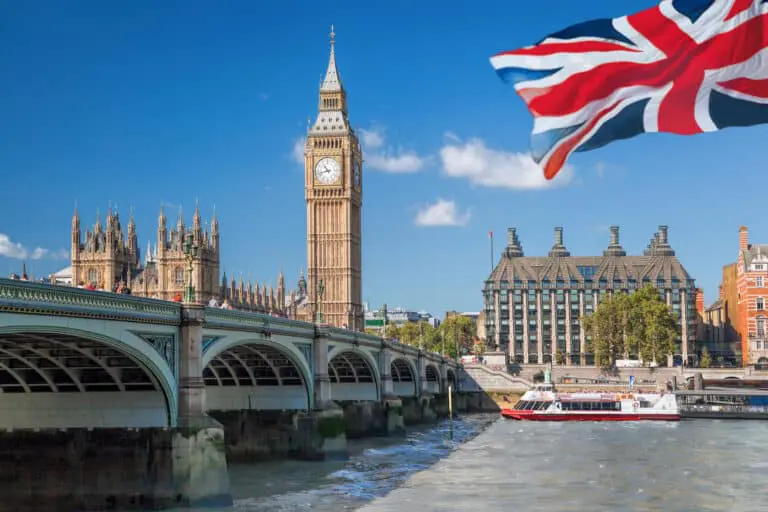 Big Ben and Houses of Parliament with boat in London, England, U