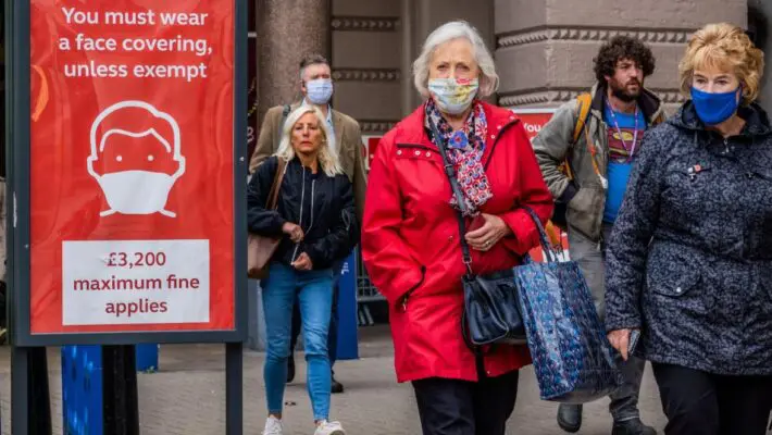 Brits in facemasks