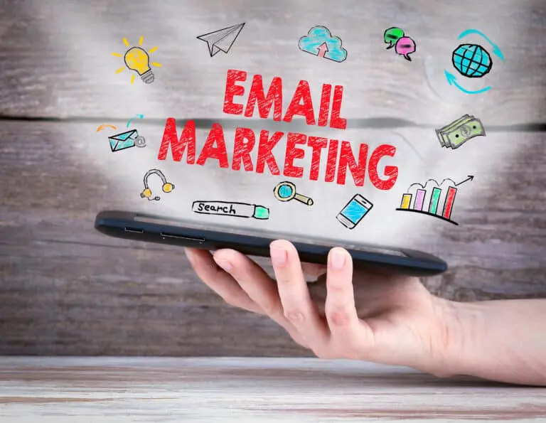 Email,Marketing,Concept.,Tablet,Computer,In,The,Hand.,Old,Wooden