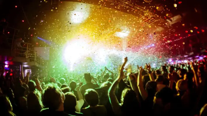 Shiny,Rainbow,Confetti,During,The,Concert,And,The,Crowd,Of