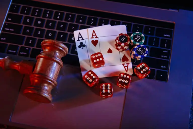Law,For,Online,Casino.,Wooden,Judge,Gavel,And,Aces,With