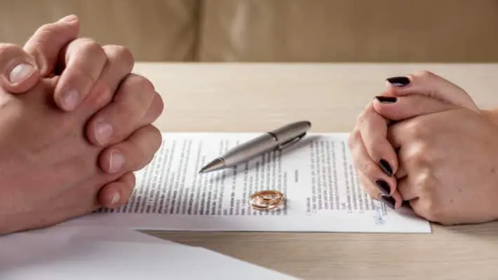 Hands,Of,Wife,And,Husband,Signing,Divorce,(dissolution,,Canceling,Marriage,