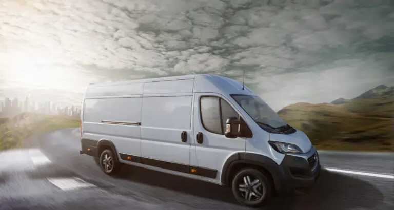 Delivery,Truck,Drives,On,A,Road