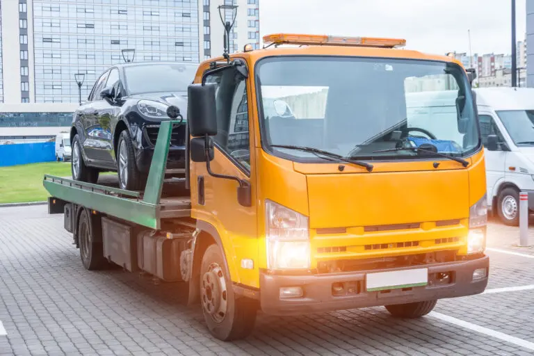Passenger,Car,Loaded,Onto,A,Recovery,Truck,For,Transportation