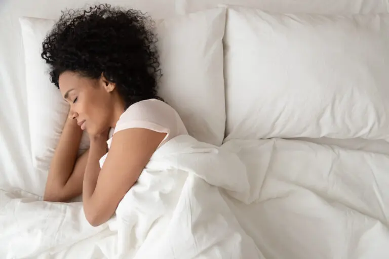 Serene,Calm,African,American,Woman,Sleeping,In,Comfortable,Bed,Lying