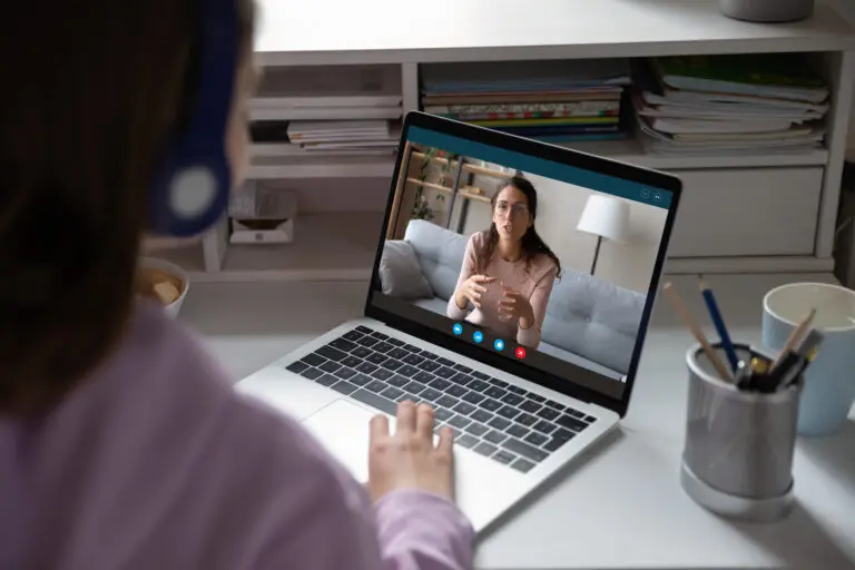 School,Teen,Girl,Student,Wears,Headphones,Distance,Learning,With,Online