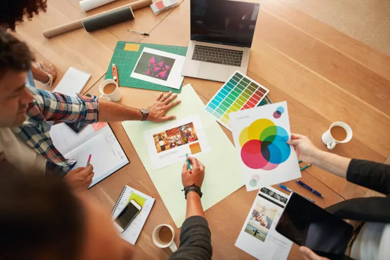 Top,View,Shot,Of,Group,Of,Creative,Designers,Discuss,The