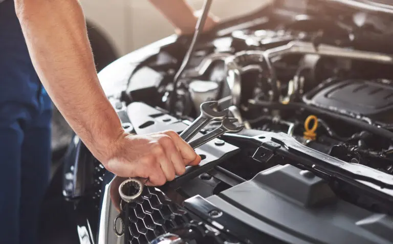 Picture,Showing,Muscular,Car,Service,Worker,Repairing,Vehicle.