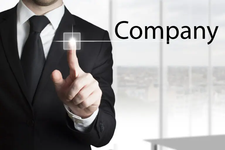 Businessman,In,Black,Suit,Pressing,Touchscreen,Button,Company