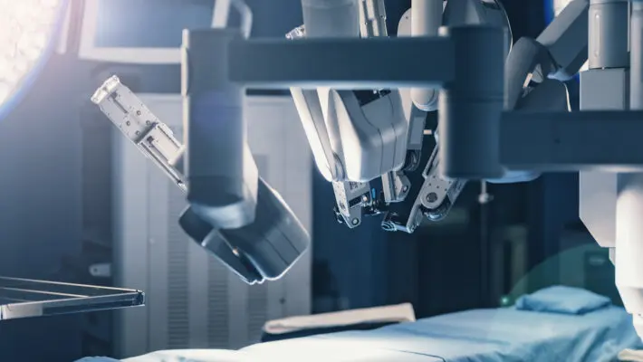 Surgical,Room,In,Hospital,With,Robotic,Technology,Equipment,,Machine,Arm