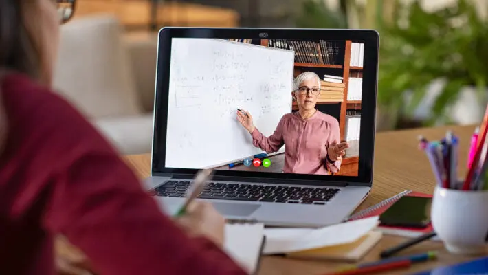 Young,Student,Watching,Lesson,Online,And,Studying,From,Home.,Young