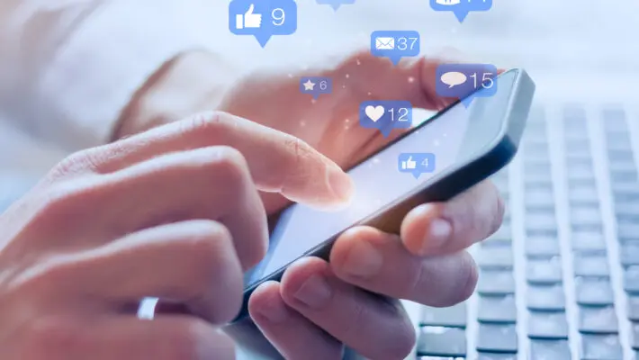 Social,Media,Interactions,On,Mobile,Phone,,Concept,With,Notification,Icons