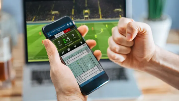 Lucky,Man,Celebrating,Money,Win.,Male,Fan,Watching,Football,Play