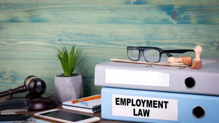 Employment,Law,Concept.,Binders,On,Desk,In,The,Office.,Business