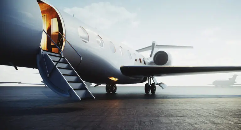 Closeup,View,Of,Private,Jet,Airplane,Parked,At,Outside,And