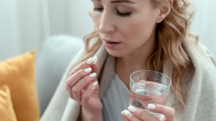People struck down with the Omicron variant of the coronavirus are buying so much paracetamol that supplies are running low in many shops.