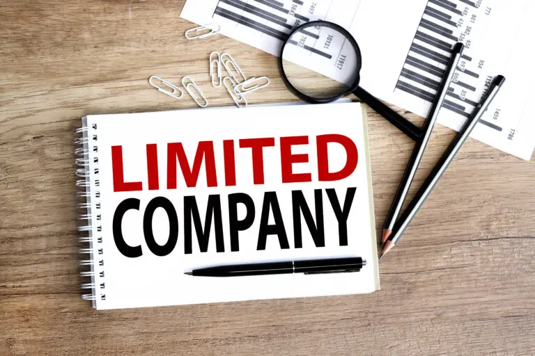 Limited,Company.,Text,On,White,Paper,On,Wood,Background