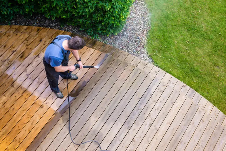 Man,Cleaning,Terrace,With,A,Power,Washer,-,High,Water