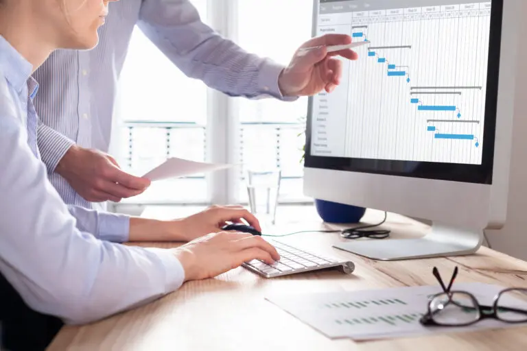 Project,Management,Team,Updating,Gantt,Chart,Schedule,Or,Planning,On