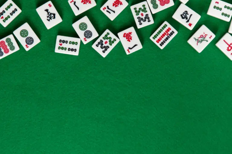 White-green,Tiles,For,Mahjong,On,On,Green,Cloth,Background.,Emty