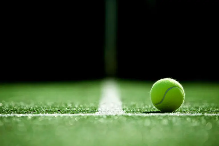 Soft,Focus,Of,Tennis,Ball,On,Tennis,Grass,Court
