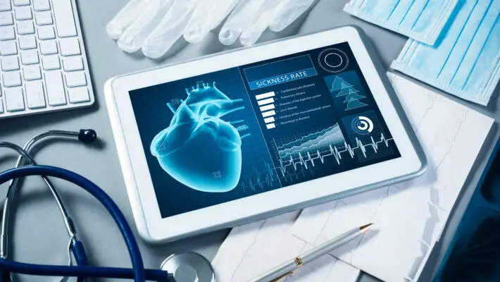 White,Tablet,Pc,And,Doctor,Tools,On,Gray,Surface