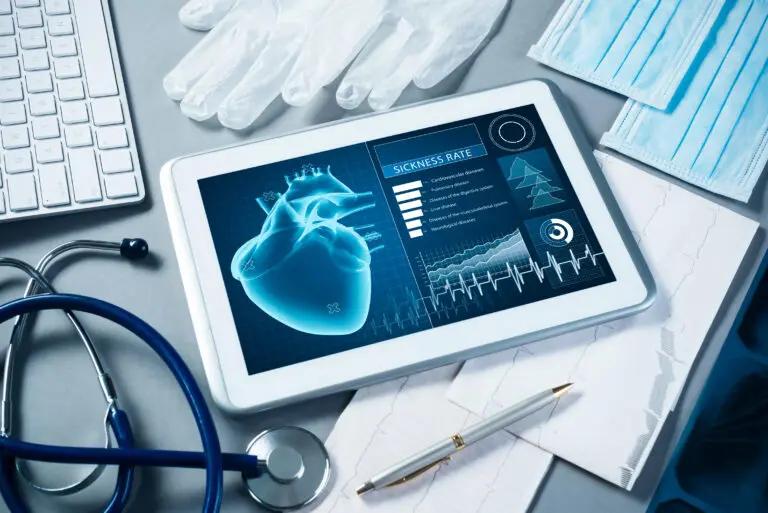White,Tablet,Pc,And,Doctor,Tools,On,Gray,Surface