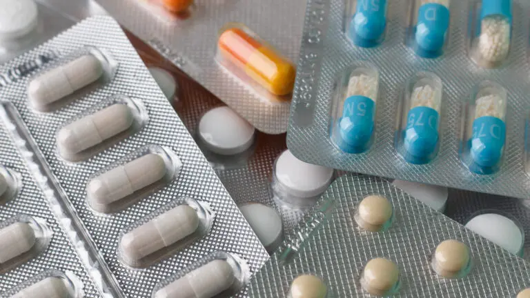A,Pile,Of,Blister,Packs,With,A,Variety,Of,Pills