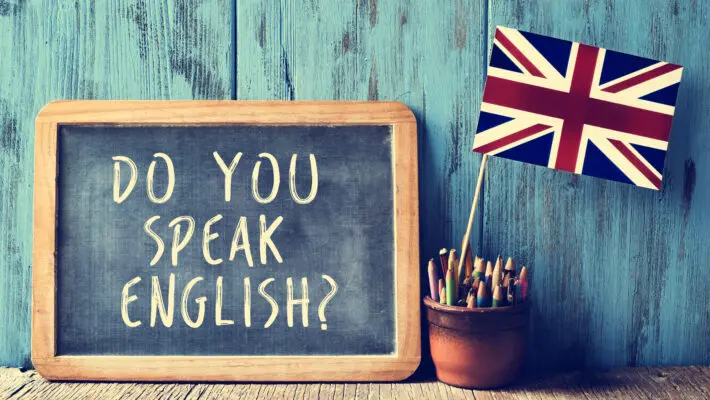 A,Chalkboard,With,The,Text,Do,You,Speak,English?,Written