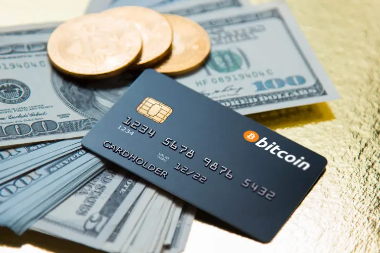 Concept,Bank,Card,Bitcoin,On,A,Golden,Background