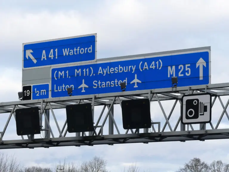 Climate activists climbed gantries on the M25 and declared the motorway a “site of civil resistance” as they pledged to block it for two days.