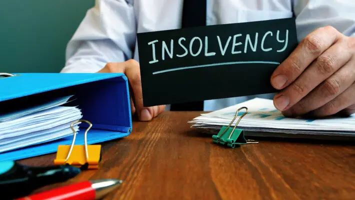 Man,Holds,Sign,Insolvency,About,Company,Bankruptcy.