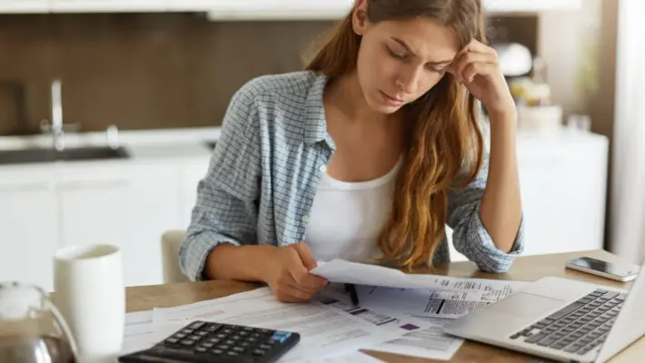 Millions of people in the UK are struggling to pay their bills, according to the City watchdog, which said a growing proportion of the population is having trouble making ends meet.