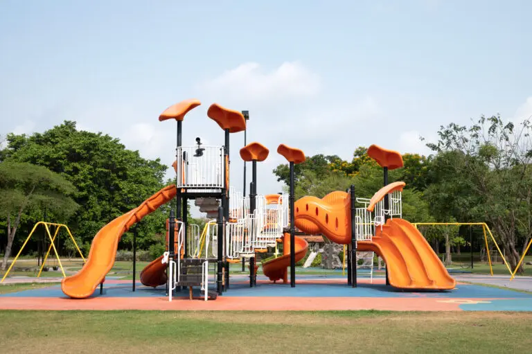 The,Outdoor,Playground,In,The,Daytime,Has,A,Backdrop,Of