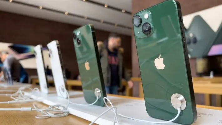 Apple sales dropped at the end of 2022 as shoppers squeezed by the rising cost of living cut back their purchases.