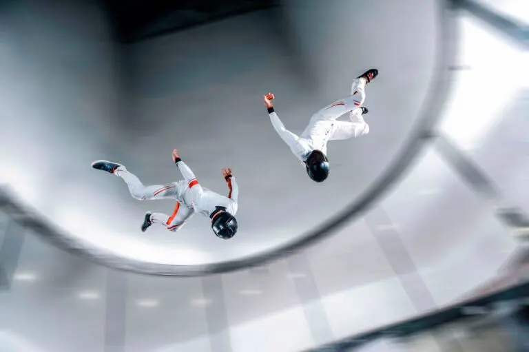 Fly,Men,Indoor,Skydive,Tunnel.,Two,Flyers,In,Wind,Tunnel.