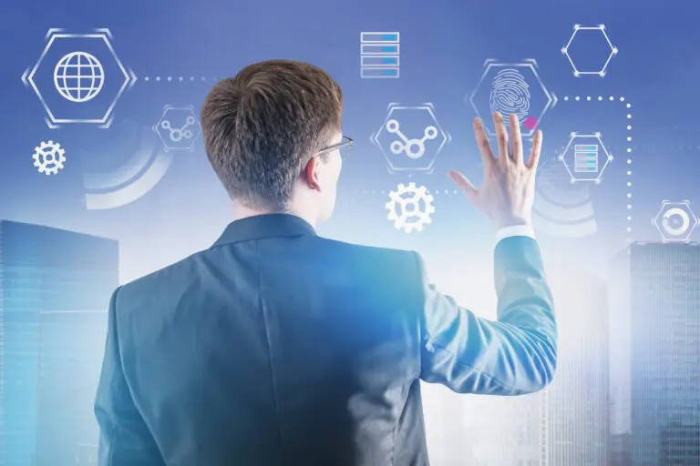 Rear,View,Of,Caucasian,Businessman,In,Glasses,Working,With,Business