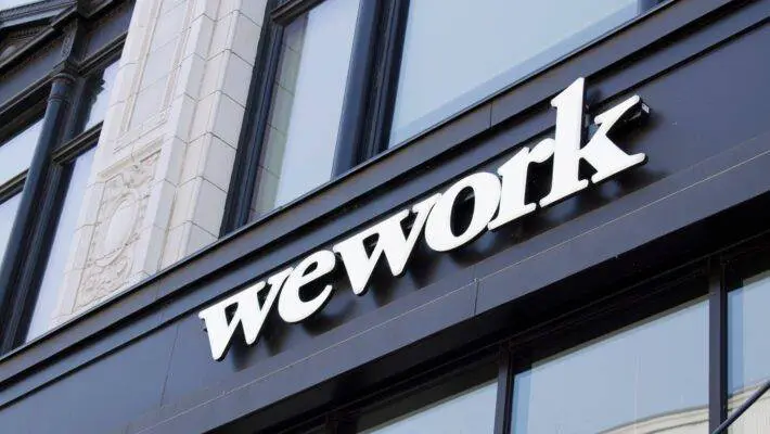 Shares in WeWork, the global office space-sharing company, have plunged after it raised "substantial doubt" about its future.