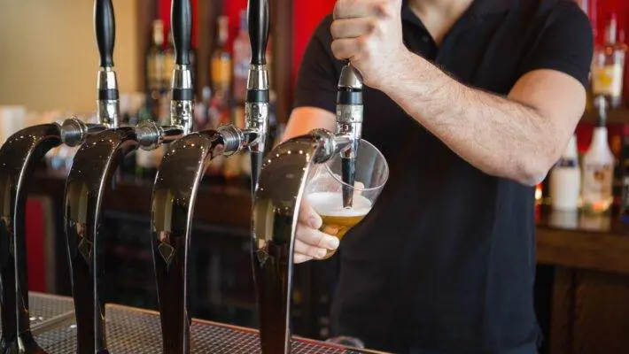 A pint of beer during the busiest periods will cost drinkers 20p more under a “dynamic pricing” system introduced by Britain’s largest pub group.