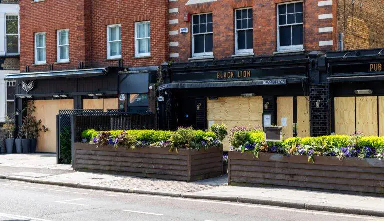 The number of pubs in England and Wales that shut their doors for good rose sharply in the first half of 2023, prompting warnings to the government that planned rises in business rates could force further closures in the beleaguered sector. Figures show that 383 pubs, or more than two a day, “vanished” in the first six months of this year, almost matching the total for the whole of 2022, when 386 were lost. The data, from the commercial real estate analysts Altus Group, measures the number of pubs that have closed down permanently because they have either been demolished or converted for use as homes or offices. The chief executive of one of Britain’s leading pub groups joined Altus in warning the chancellor, Jeremy Hunt, that more closures could follow if he goes ahead with plans to scrap a discount on business rates. Chris Jowsey, the chief executive of 1,000-strong chain Admiral Taverns, said the relief was vital for many pubs. “Without it, costs for many pubs will rise dramatically by many thousands of pounds, fuelling inflation and forcing closure for many independents,” he said. “Having survived Covid-19 and the cost of living crisis, it would be tragic if the government now chose to increase rates bills and brought about pub closures.” Pubs, like other hospitality, leisure and retail businesses, now benefit from a 75% discount on their business rate bills, capped at £110,000. Hunt announced the £2.1bn relief scheme at his autumn statement in November 2022, but the discount is scheduled to end in March 2024. The effect of the relief being phased out will be exacerbated by a scheduled rise in the headline business rates in line with inflation, an increase set to take effect in April next year. This could add 6% to bills, Altus Group said, calling on Hunt to continue rate relief beyond March next year. “With energy costs up 80% year-on-year, in a low-growth, high-inflation and high interest rates environment, the last thing pubs need is an average business rates hike of £12,385 next year,” said Alex Probyn, the head of property tax at Altus Group. The pubs industry, one of the hardest-hit by the restrictions on socialising imposed during the pandemic, has struggled to recover in the face of sky-high energy bills, the soaring cost of ingredients and difficulties in hiring staff. skip past newsletter promotion Sign up to Business Today Free daily newsletter Get set for the working day – we'll point you to all the business news and analysis you need every morning Privacy Notice: Newsletters may contain info about charities, online ads, and content funded by outside parties. For more information see our Privacy Policy. We use Google reCaptcha to protect our website and the Google Privacy Policy and Terms of Service apply. after newsletter promotion Britain’s biggest pub group, Stonegate – the owner of chains such as the Slug & Lettuce and Yates’s – has told patrons it will start charging them a 20p premium on pints during busy periods, such as the weekend. The Federation of Small Businesses (FSB) is also urging the government to extend the 75% rates relief discount for retail, hospitality and leisure businesses beyond next spring’s cutoff, and to increase the threshold for small business rates relief from £12,000 to at least £25,000. That would remove more than 250,000 small businesses from the rates system, they say. “For many small businesses on the high street and town centres, the current relief is a lifeline, said the FSB’s national chair, Martin McTague. “In April this is due to end, creating a cliff edge that will be hugely damaging to thousands of businesses. Ensuring the relief is maintained for those businesses that need it most will be key to their survival.”