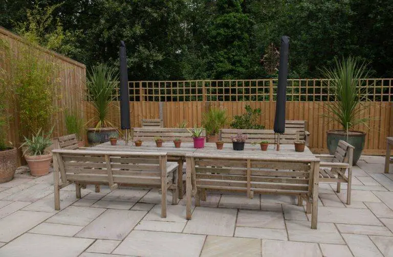 Feeling the soft grass beneath your feet as you lounge on the patio furniture, sunshine warming your skin - it's pure bliss. Now imagine adding natural sandstone into the mix, with its earthy textures and charming elegance.