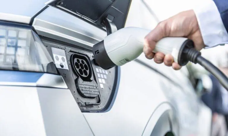 The number of new cars registered in the UK has jumped by nearly 18% but electric vehicle demand is flatlining, prompting the industry to call for a VAT cut to stimulate sales.
