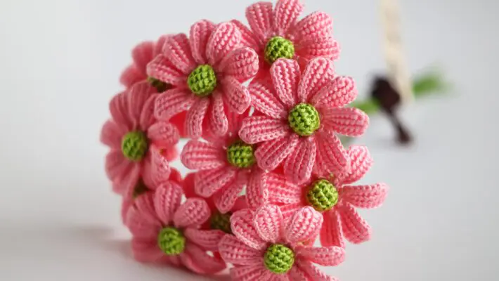 Crocheting flowers is a delightful and rewarding craft that can add a touch of beauty to various projects, from accessories to home decor.
