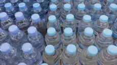 John Lewis has been forced to supply months’ worth of bottled water to residents in a Hampshire village after fertiliser pollution made the local supply unsafe to drink.