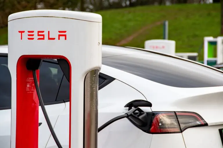 Tesla has almost halved the cost of leasing its electric cars in Britain, in a bid to reverse sliding sales and shore up its market share against fast-growing Chinese competitors.